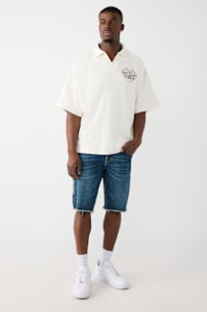 POLO SURDIMENSIONN&Eacute; AVEC LOGO DE TIGRE