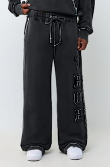 LOGO APPLIQU&Eacute; BIG T BAGGY SWEATPANT