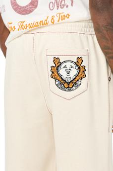 STENCIL LOGO BIG T BAGGY JOGGER