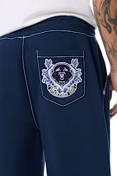 STENCIL LOGO BIG T BAGGY JOGGER