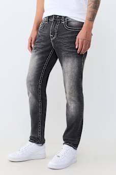 STACKED SKINNY FLAP JEAN