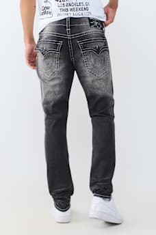 STACKED SKINNY FLAP JEAN