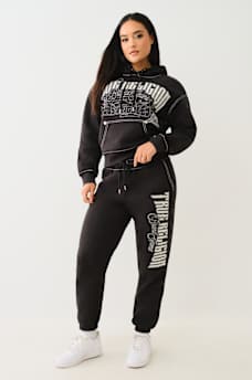 PANTALONES JOGGER AMPLIOS BORDADOS