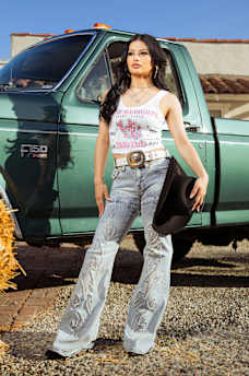 TRUE RELIGION X BELLA DOÑA MID RISE CUT OUT FLARE JEAN, image 1