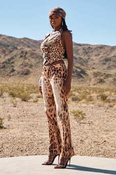 BECCA MID RISE LEOPARD FLAP BOOTCUT JEAN, image 1