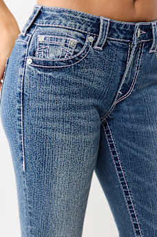 JENNIE MID RISE BIG T CURVY SKINNY JEAN