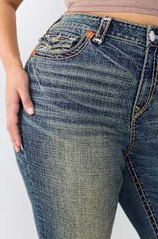 PLUS BECCA MID RISE SUPER T FLAP BOOTCUT JEAN
