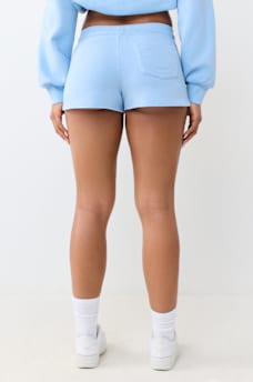 ZIP POCKET DOLPHIN HEM HOT SHORT