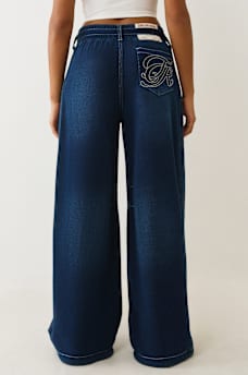 PANTALON EN MOLLETON COUPE BALLON D&Eacute;LAV&Eacute; INDIGO