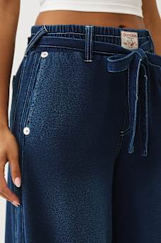 PANTALON EN MOLLETON COUPE BALLON D&Eacute;LAV&Eacute; INDIGO