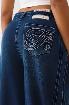 PANTALON EN MOLLETON COUPE BALLON D&Eacute;LAV&Eacute; INDIGO