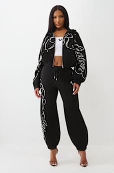 PANTALONES JOGGER HOLGADOS CON CRISTALES, image 2