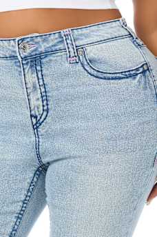 PLUS JENNIE MID RISE SUPER T CURVY SKINNY JEAN