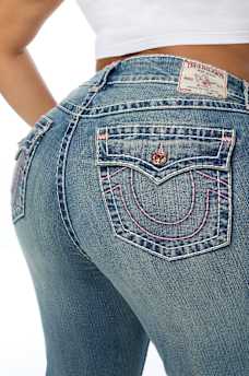PLUS BECCA MID RISE SUPER T FLAP BOOTCUT JEAN