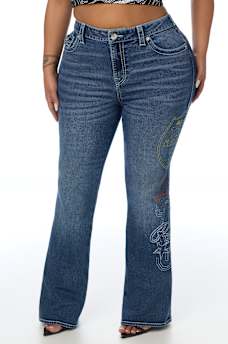 PLUS BECCA MID RISE EMBROIDERED BIG T FLAP BOOTCUT JEAN