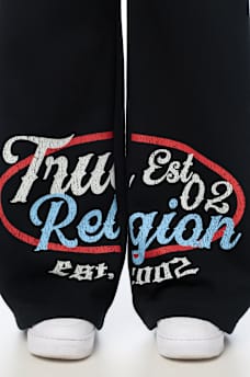 EMBROIDERED MID RISE WIDE LEG SWEATPANT