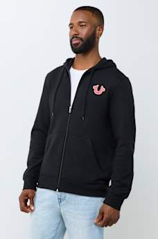 SUDADERA CON CAPUCHA Y CIERRE CON LETRERO DE TRUE