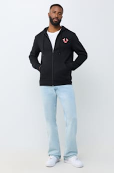 SUDADERA CON CAPUCHA Y CIERRE CON LETRERO DE TRUE