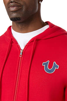 SUDADERA CON CAPUCHA Y CIERRE CON LETRERO DE TRUE