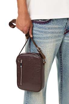 CLASSIC EMBOSSED LOGO SLING BAG